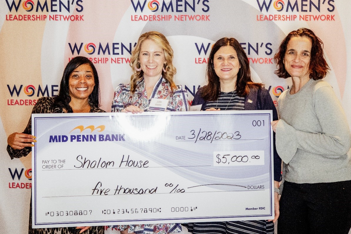 women holding check